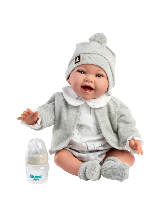 Papusa Zuri, 42 cm Fara Par, Corp Vinil+Textil cu Salopeta Scurta Alb-Gri si Jacheta Tricotat Gri 10300  Guca Munecas