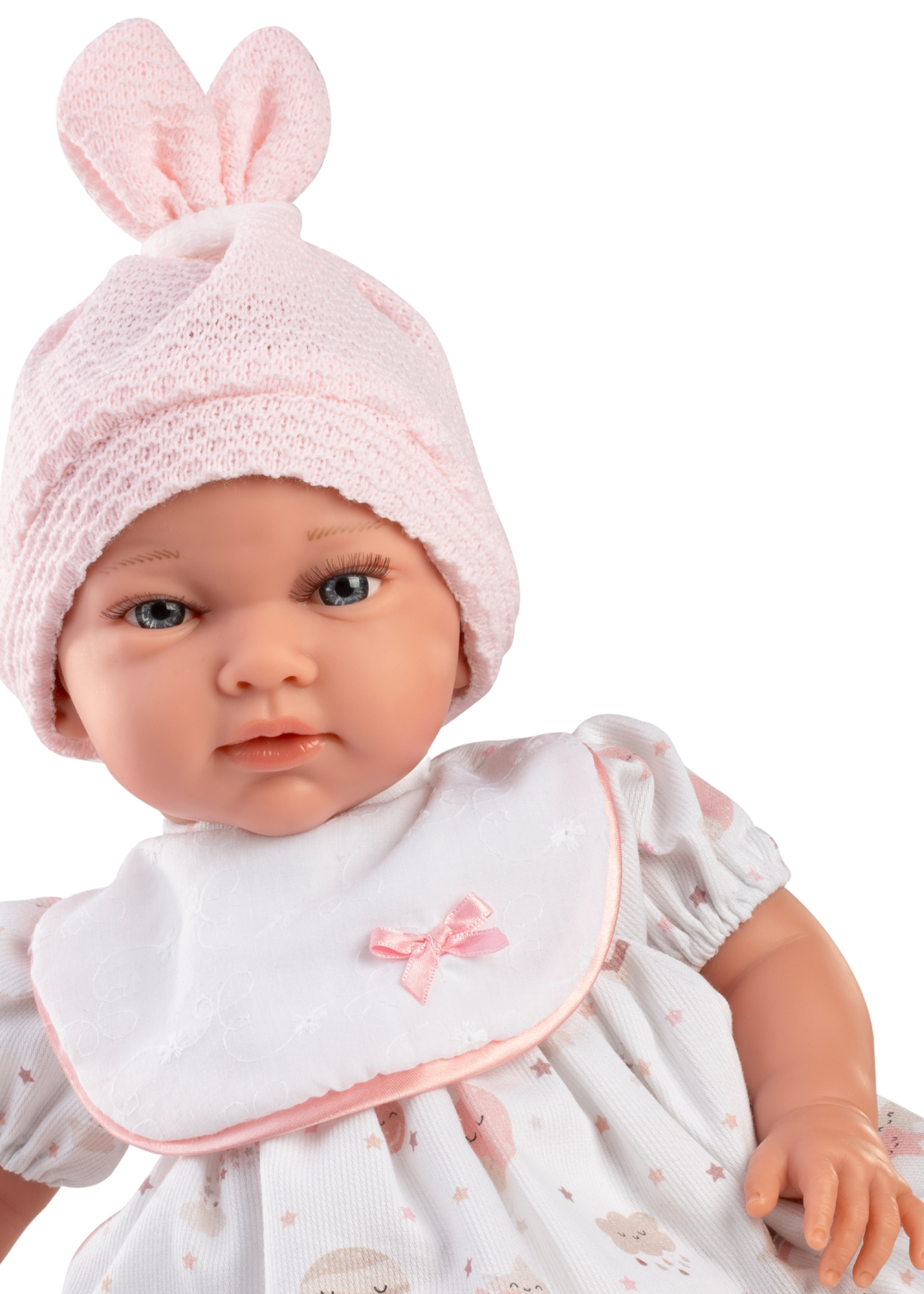 Papusa Vega, 42 cm, Fara Par, Corp Vinil+Textil cu Rochita Alba Imprimeu Planete si Caciula Roz 888 Guca Munecas